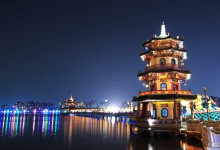 pagoda with light on west lake of hangzhou